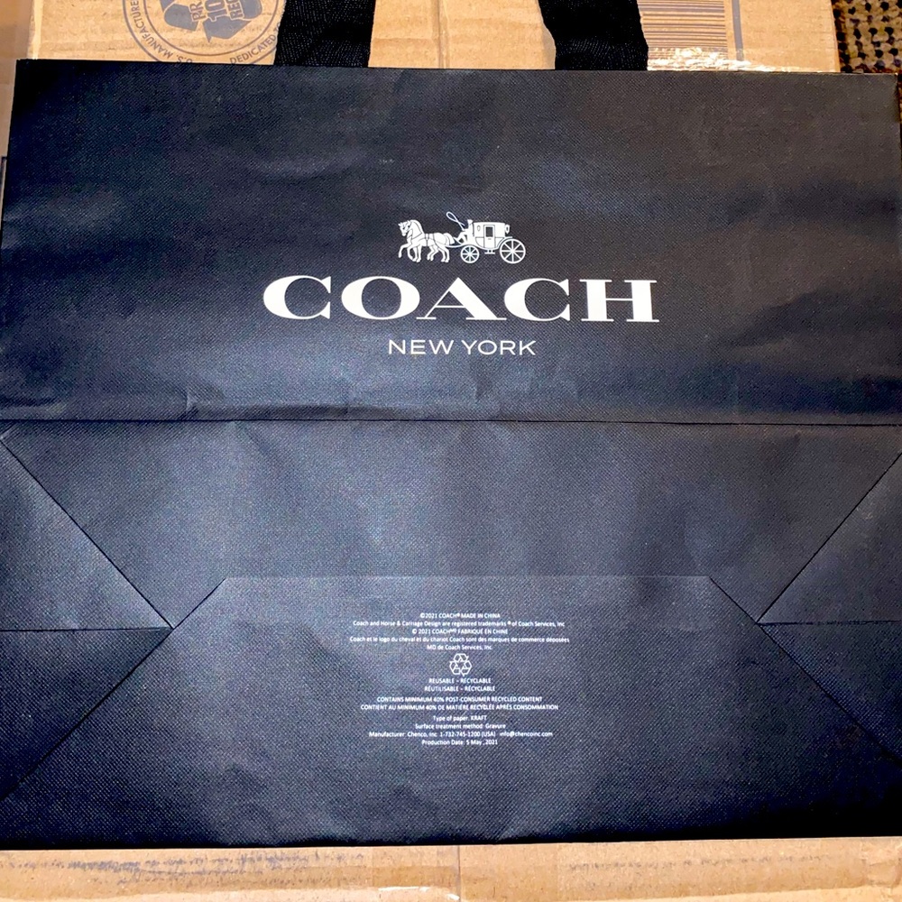 SOLD: Coach gift bag and dust bag